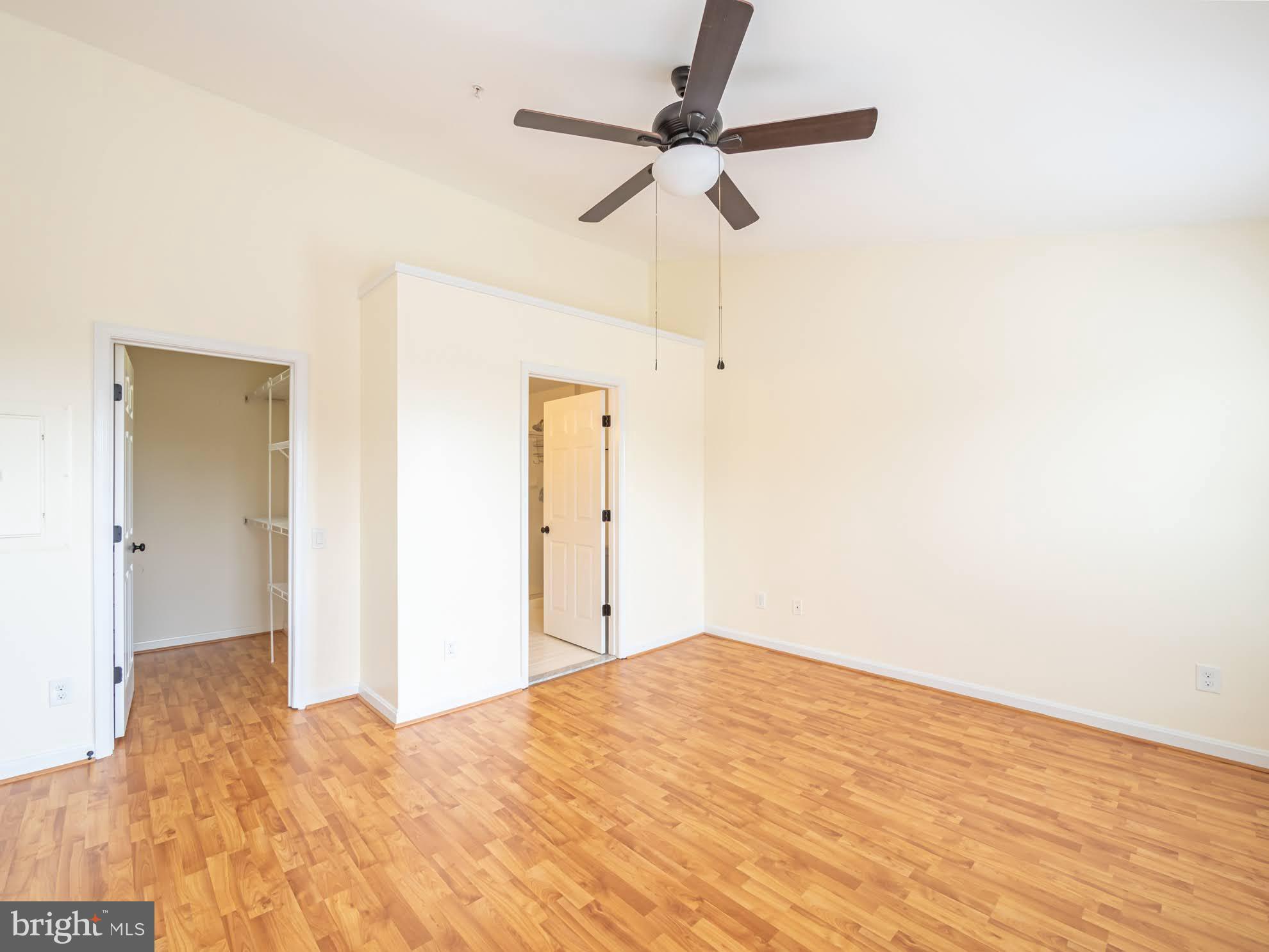 12755 Fair Crest Court, Unit 301 Fairfax, VA 22033 - Photo 13 of 24 a view of empty room with wooden floor