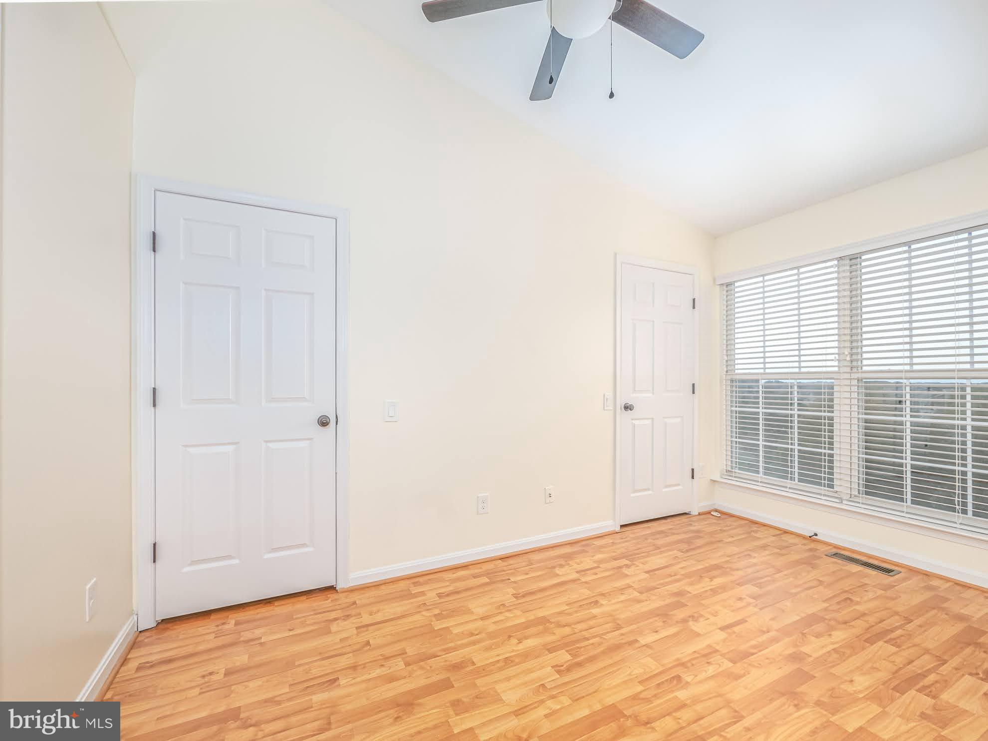 12755 Fair Crest Court, Unit 301 Fairfax, VA 22033 - Photo 18 of 24 a view of an empty room with a window