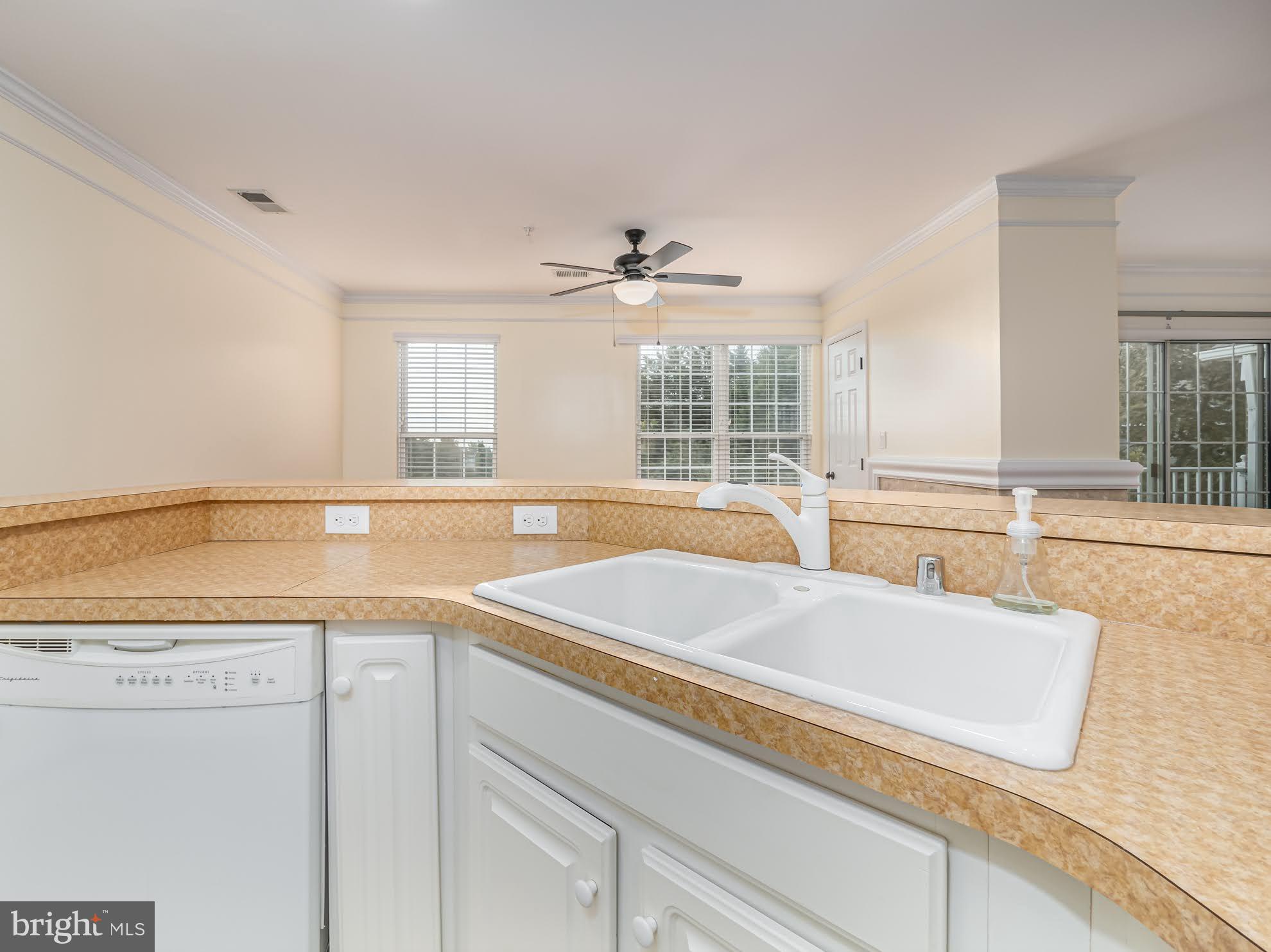 12755 Fair Crest Court, Unit 301 Fairfax, VA 22033 - Photo 7 of 24 a spacious bathroom with a sink a bathtub and next to a window