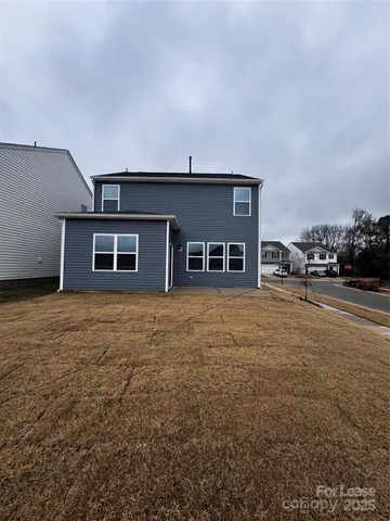 a house view with a backyard space