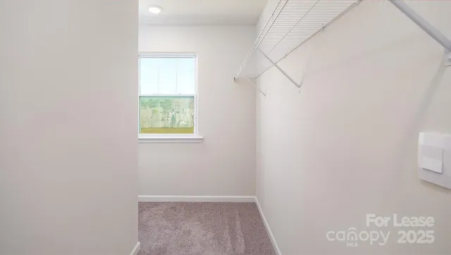 a view of a small space with window in it