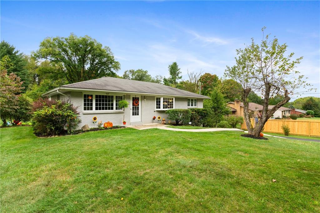 412 Holyoke Road Butler, PA 16001 - Photo 1 of 29 a front view of a house with yard and green space