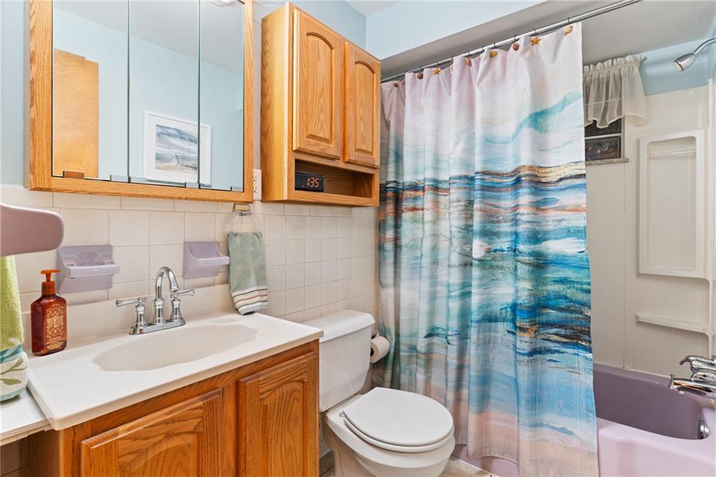 412 Holyoke Road Butler, PA 16001 - Photo 15 of 29 a bathroom with a sink a toilet and shower