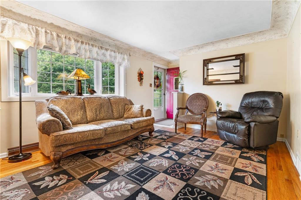 412 Holyoke Road Butler, PA 16001 - Photo 2 of 29 a living room with furniture and a window