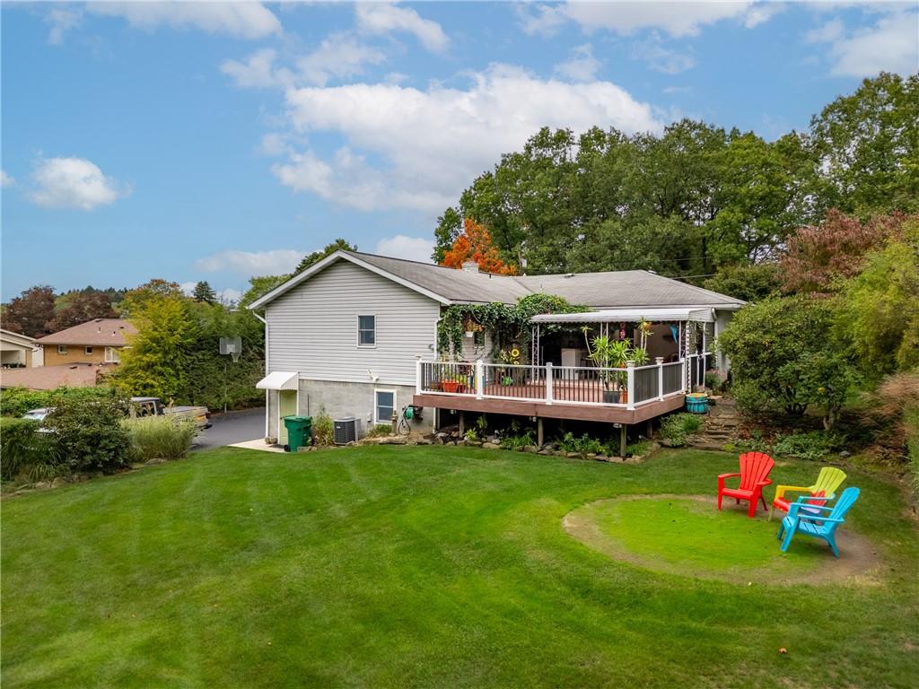412 Holyoke Road Butler, PA 16001 - Photo 21 of 29 a view of a house with a yard and sitting area