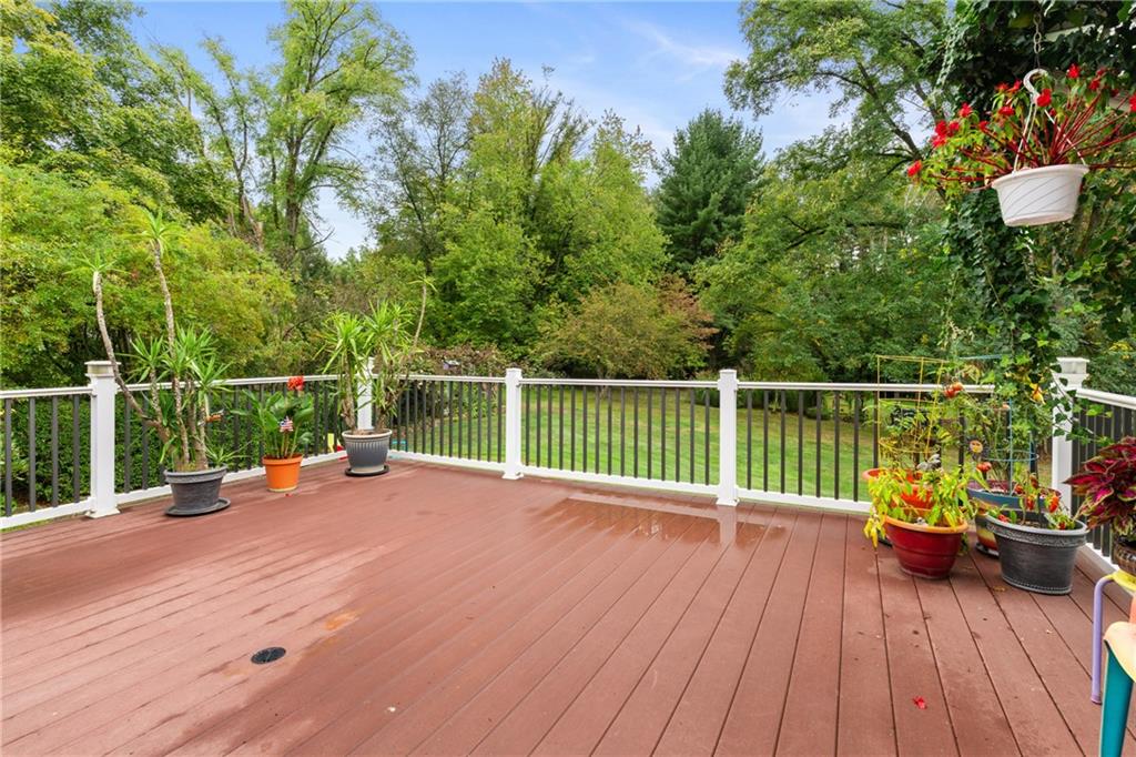 412 Holyoke Road Butler, PA 16001 - Photo 24 of 29 a view of a deck with a wooden floor and fence