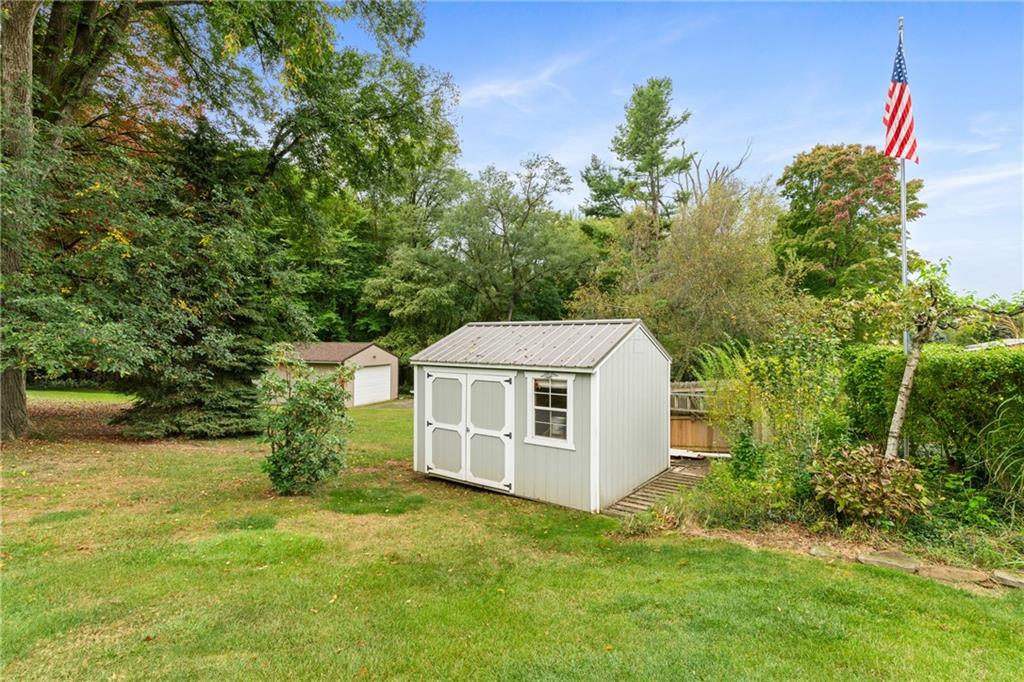 412 Holyoke Road Butler, PA 16001 - Photo 27 of 29 a aerial view of a house with yard and trees in the background