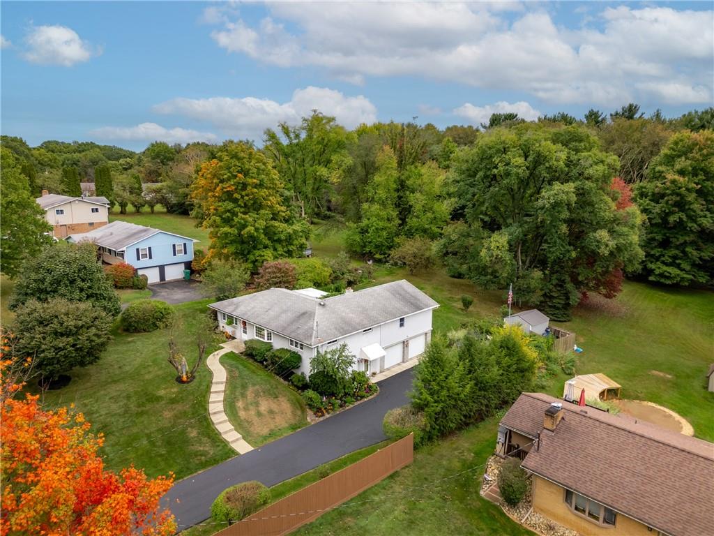 412 Holyoke Road Butler, PA 16001 - Photo 29 of 29 an aerial view of a house with a garden and lake view