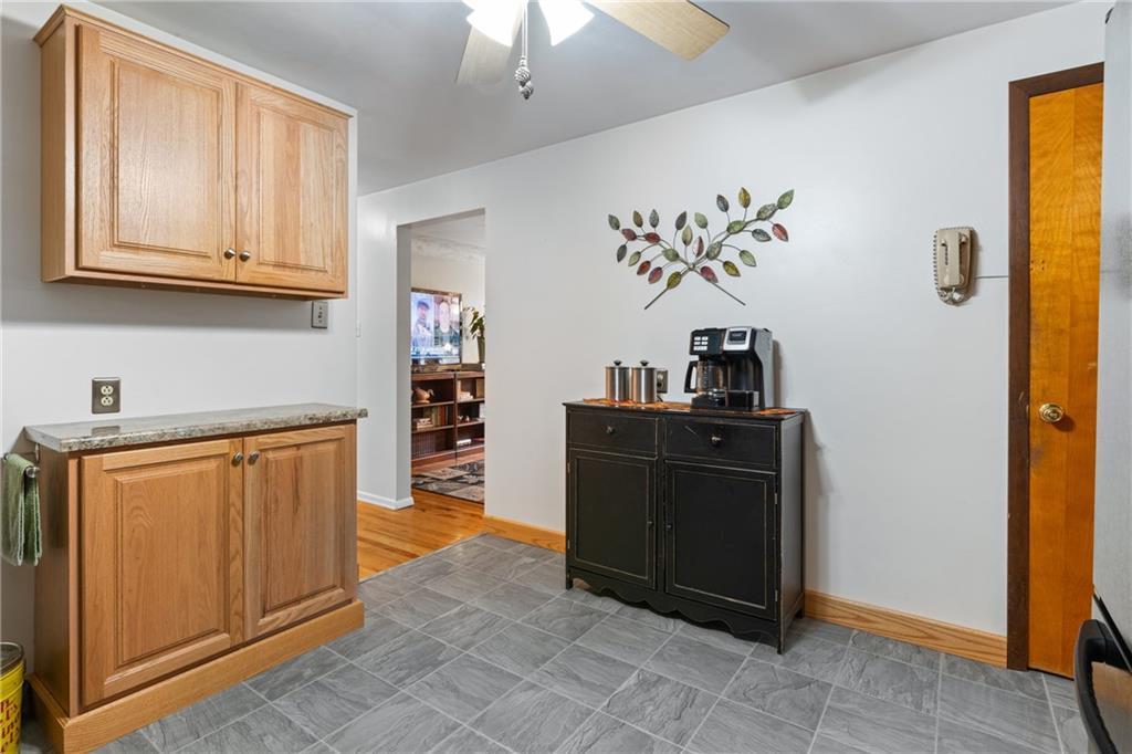 412 Holyoke Road Butler, PA 16001 - Photo 5 of 29 a kitchen with stainless steel appliances granite countertop a refrigerator and a stove top oven