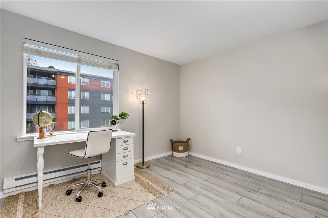 7001 Sand Point Way Northeast, Unit C309 Seattle, WA 98115 - Photo 15 of 38 a view of a workspace with furniture and a window