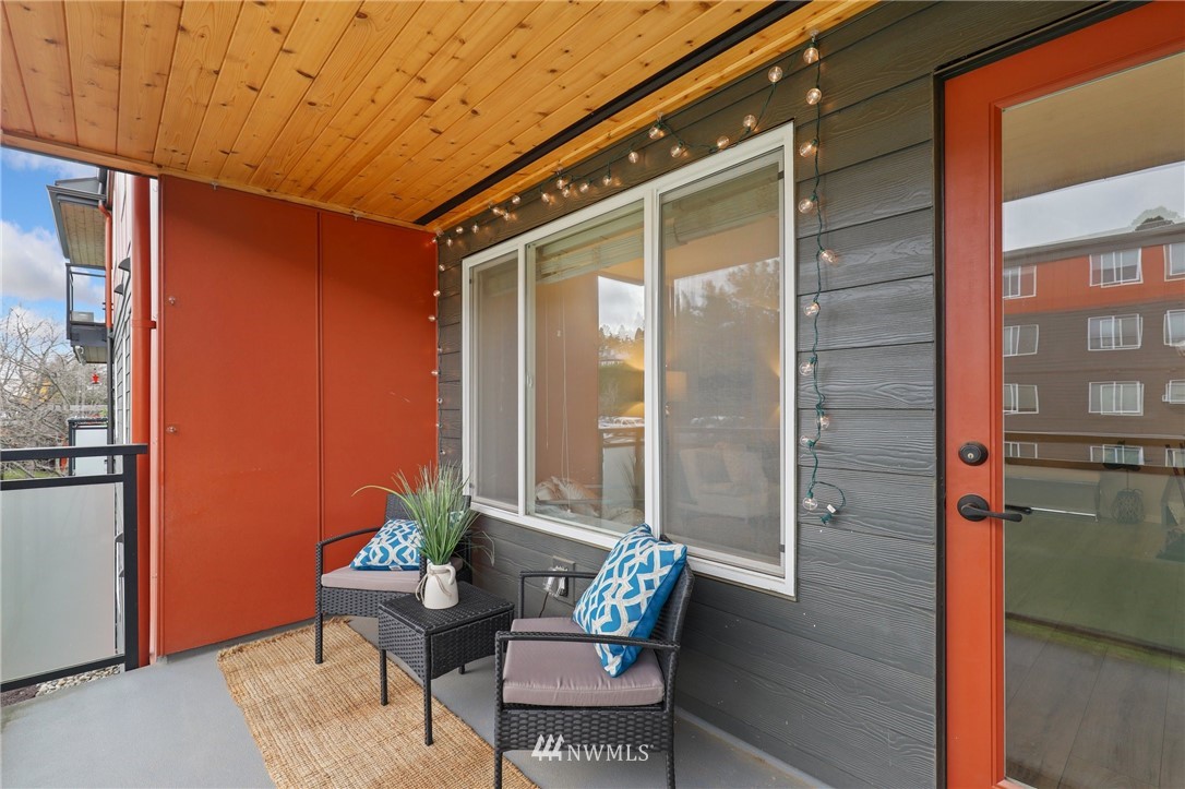 7001 Sand Point Way Northeast, Unit C309 Seattle, WA 98115 - Photo 19 of 38 a outdoor living space with furniture and a potted plant