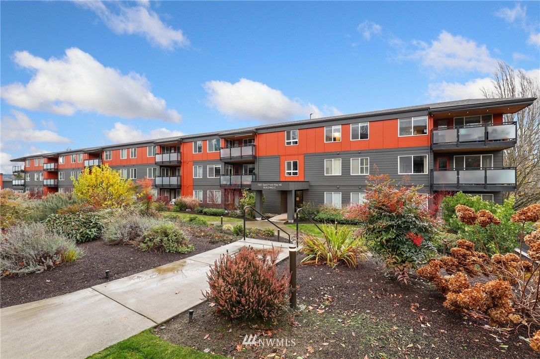 7001 Sand Point Way Northeast, Unit C309 Seattle, WA 98115 - Photo 23 of 38 a view of a house with a yard and potted plants