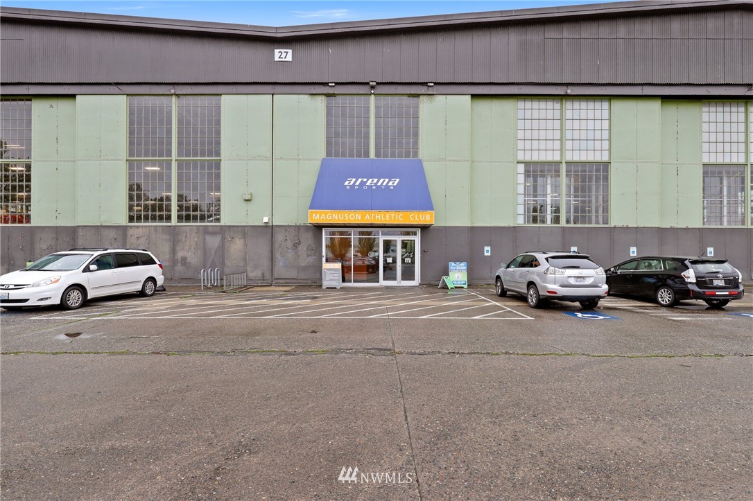7001 Sand Point Way Northeast, Unit C309 Seattle, WA 98115 - Photo 35 of 38 a car parked in front of a building