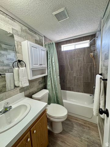 972 Ridgeway Loop, Unit 228 Garden City, UT 84028 - Photo 16 of 26 2nd Bathroom featuring vanity, shower / tub combo with curtain