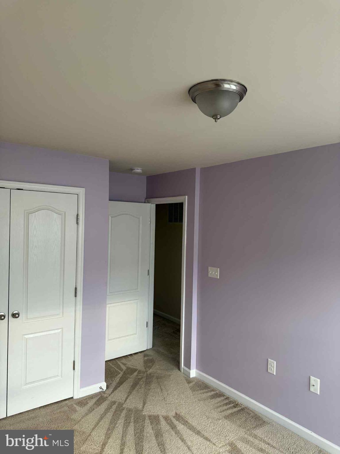1130 Stallion Street Ranson, WV 25438 - Photo 11 of 24 an empty room with closet and windows
