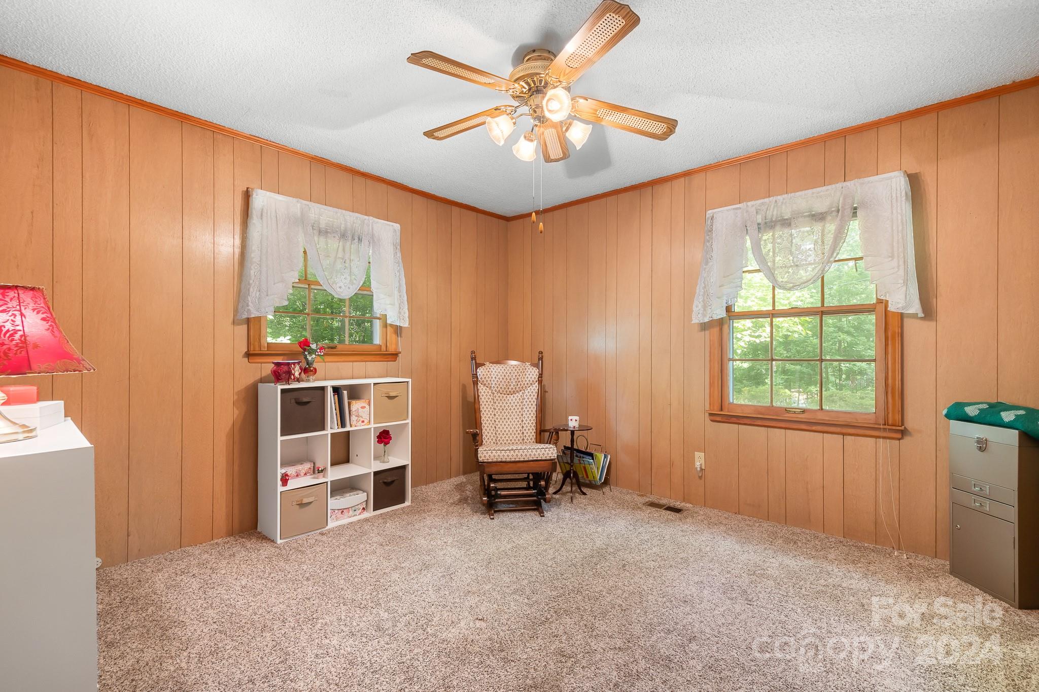 918 Blacksnake Road Stanley, NC 28164 - Photo 19 of 41 a room with furniture and a window