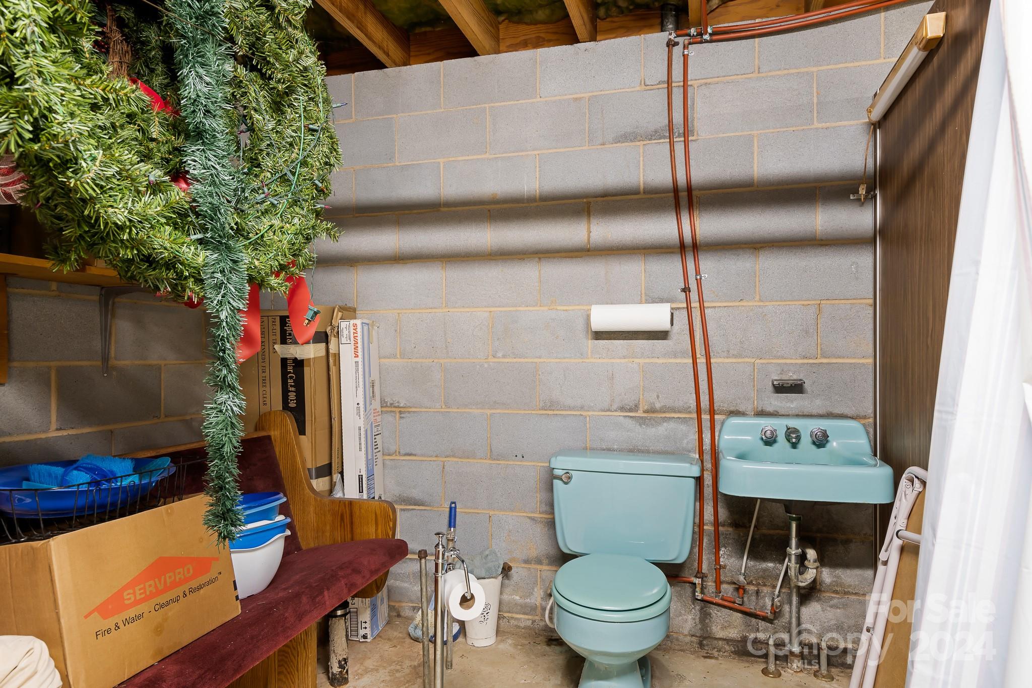 918 Blacksnake Road Stanley, NC 28164 - Photo 24 of 41 a bathroom with a toilet and a shower