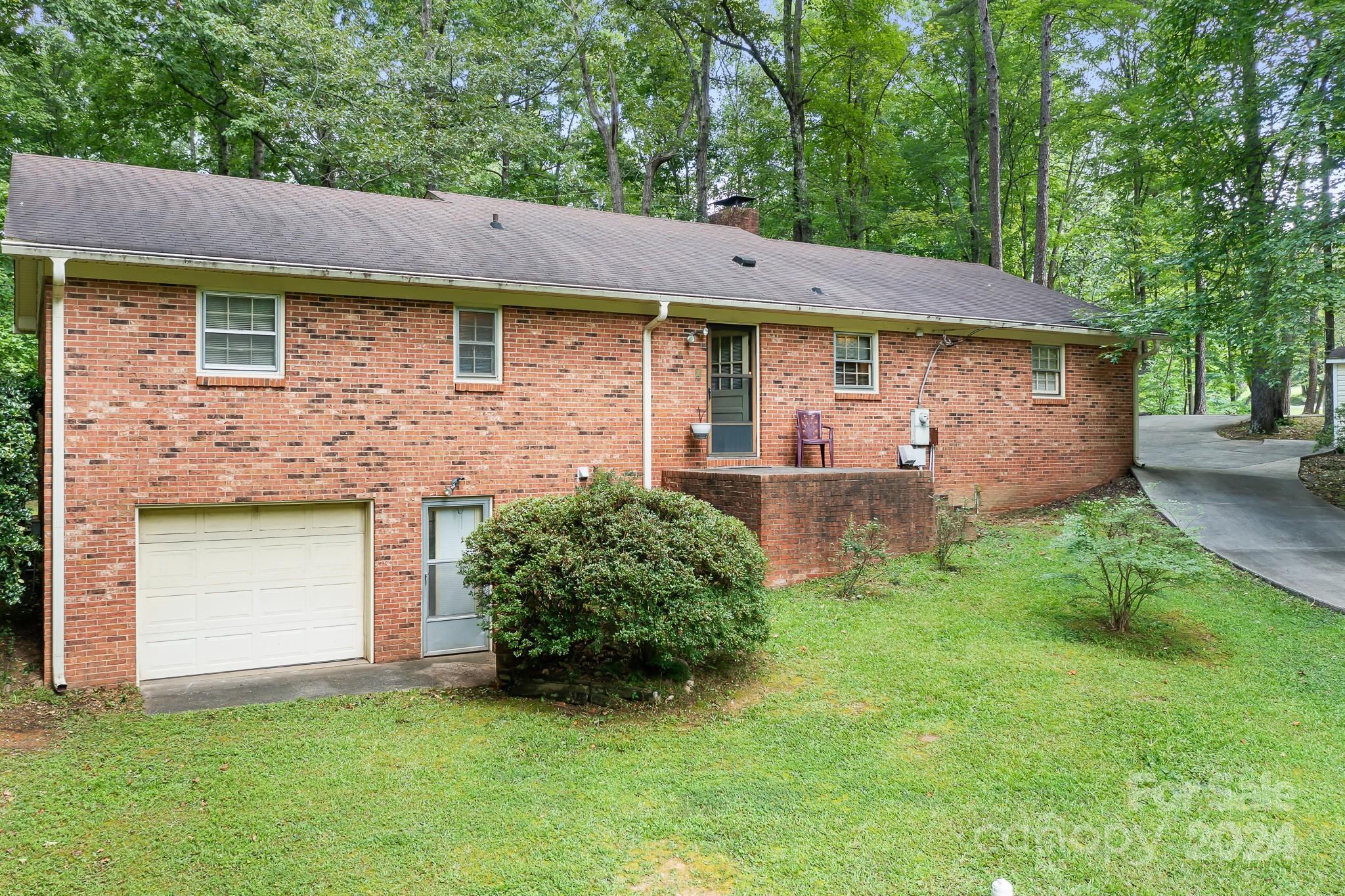 918 Blacksnake Road Stanley, NC 28164 - Photo 28 of 41 front view of a house with a yard