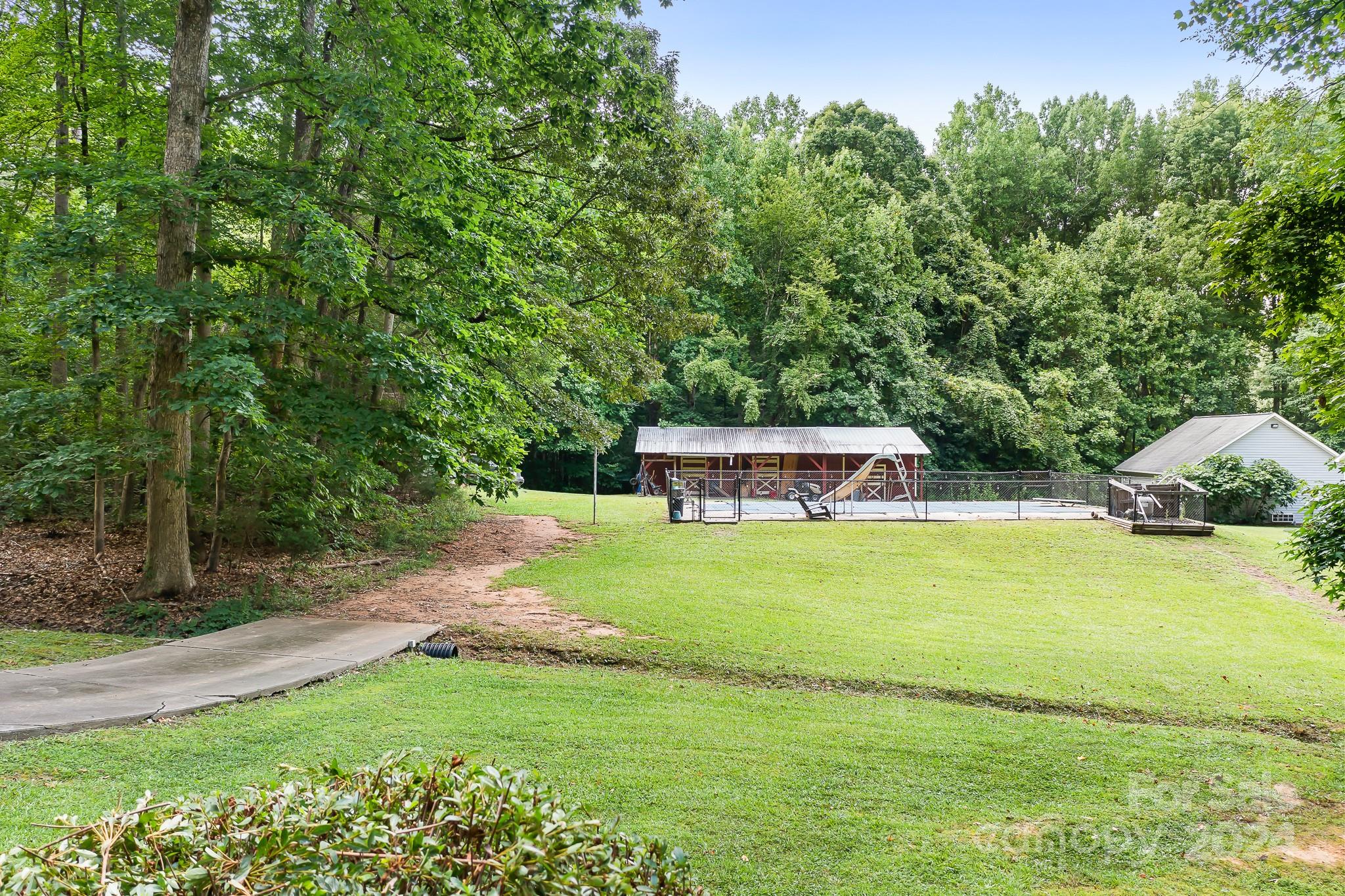 918 Blacksnake Road Stanley, NC 28164 - Photo 31 of 41 a front view of a house with a yard