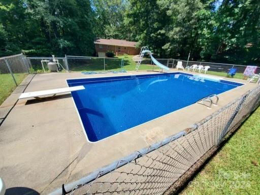 918 Blacksnake Road Stanley, NC 28164 - Photo 34 of 41 a view of a swimming pool with a patio