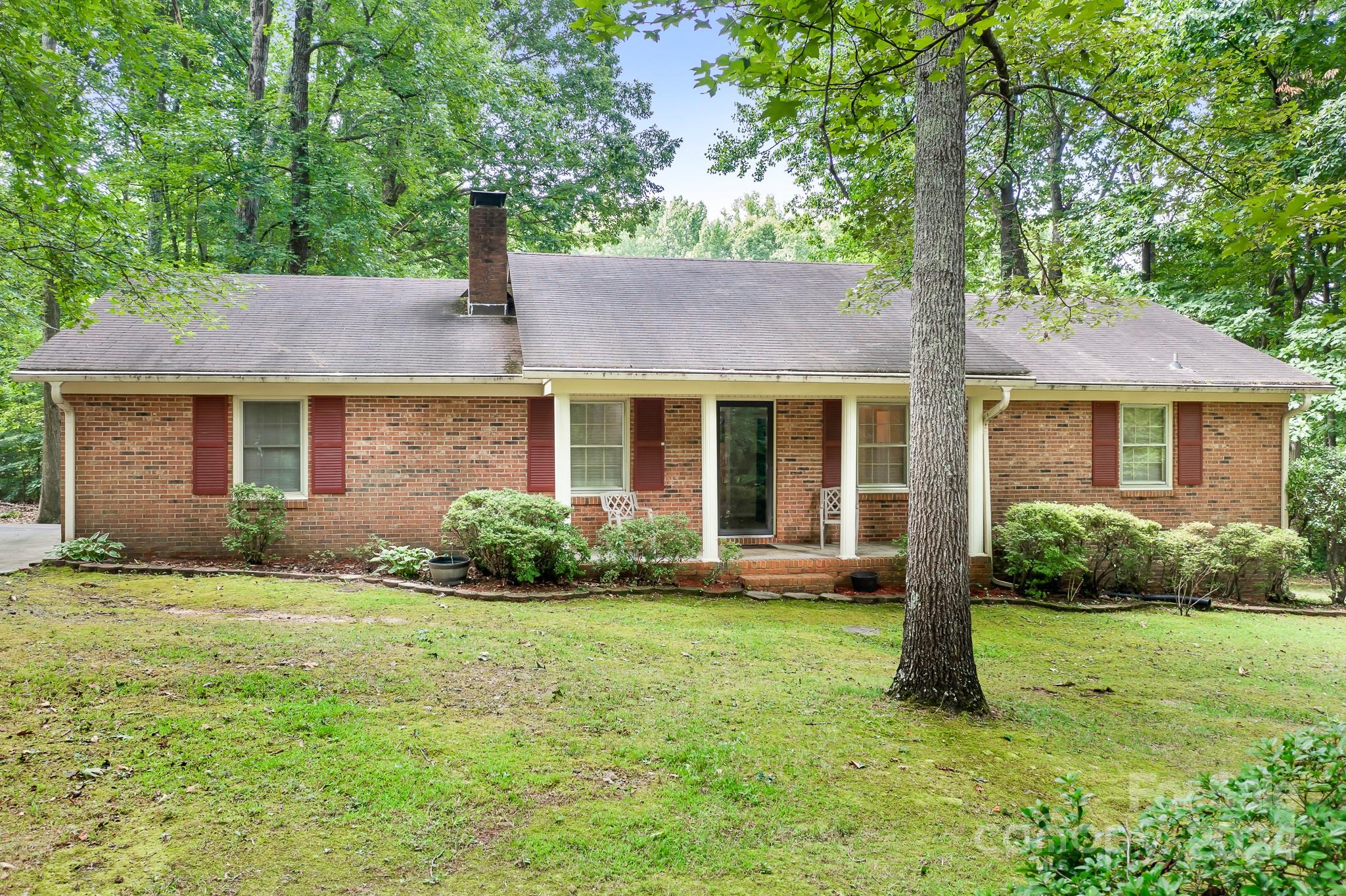 918 Blacksnake Road Stanley, NC 28164 - Photo 38 of 41 a front view of house with yard and green space