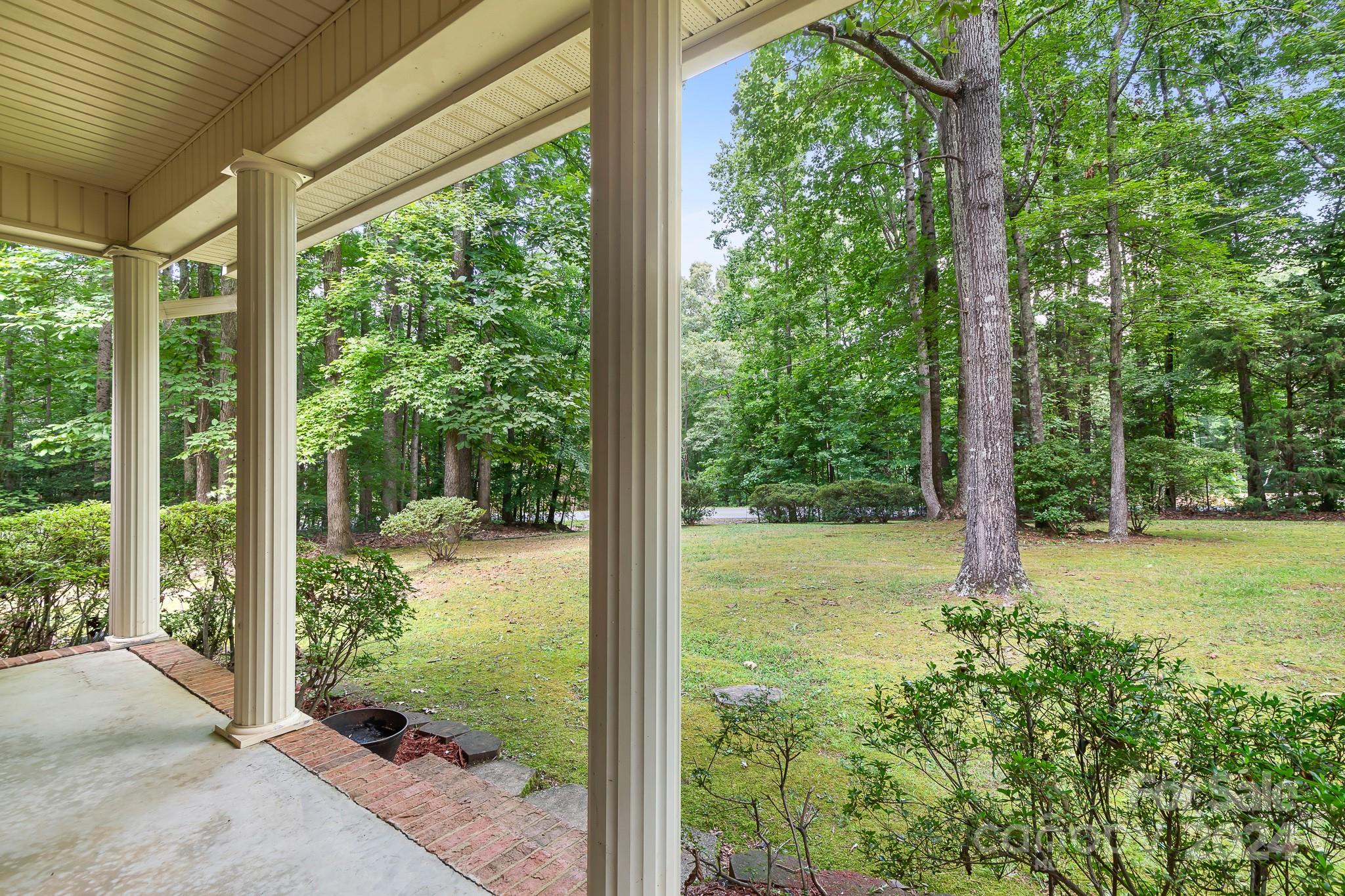 918 Blacksnake Road Stanley, NC 28164 - Photo 5 of 41 a view of a garden with plants