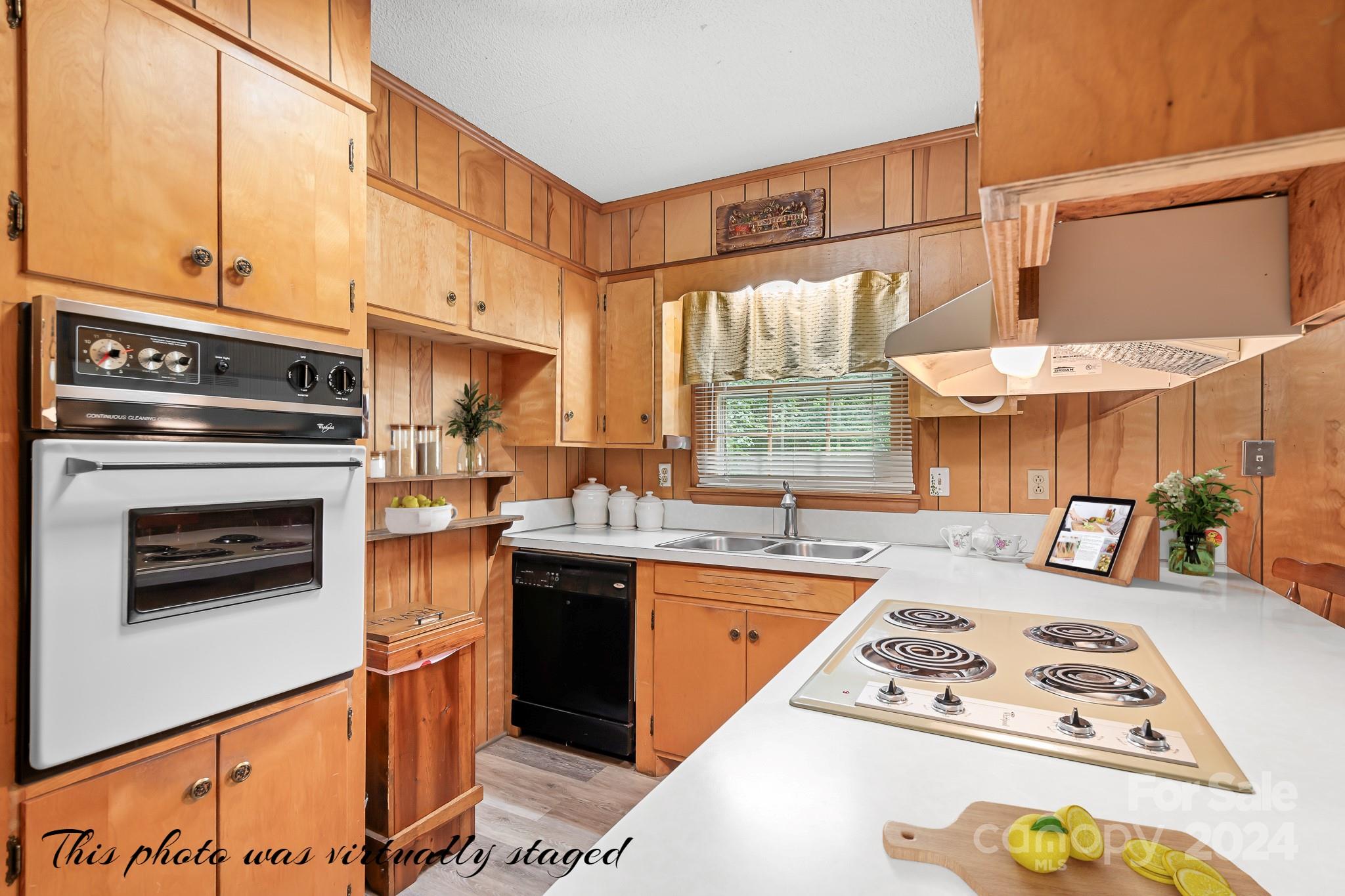 918 Blacksnake Road Stanley, NC 28164 - Photo 6 of 41 a kitchen with stainless steel appliances granite countertop a stove a sink and a microwave