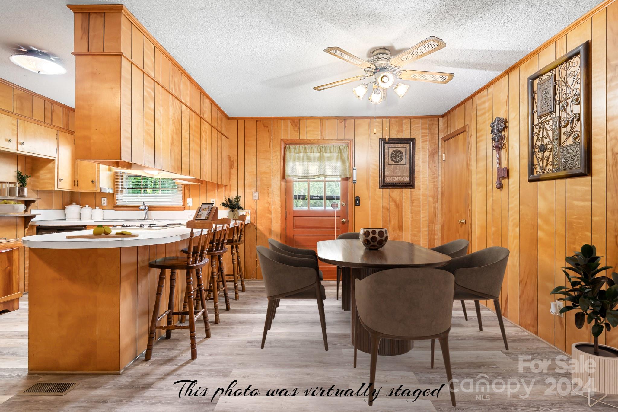 918 Blacksnake Road Stanley, NC 28164 - Photo 10 of 41 a view of a a dining room with furniture window and wooden floor