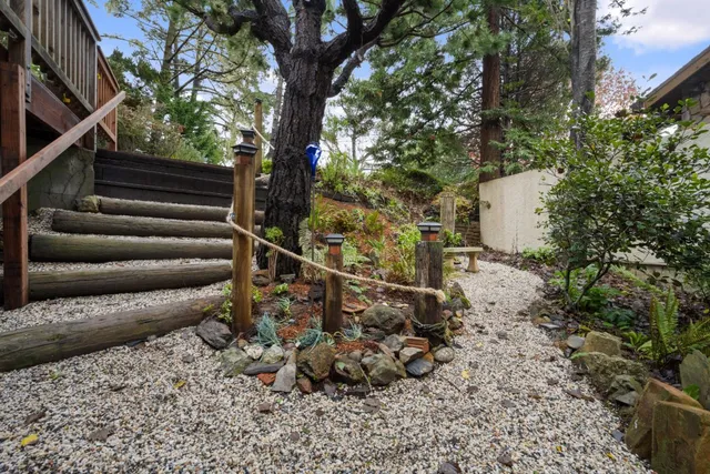 a backyard of a house with lots of green space