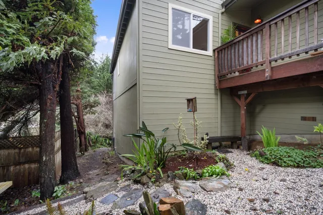 a backyard of a house with lots of green space