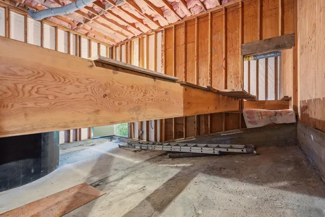 a view of a house with a small yard