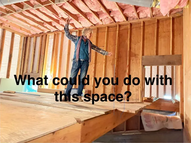 a view of a balcony with furniture and floor to ceiling window