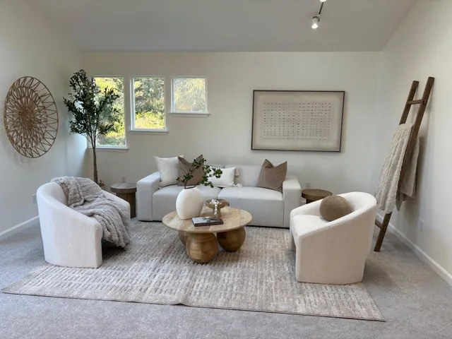 a living room with furniture and a couch
