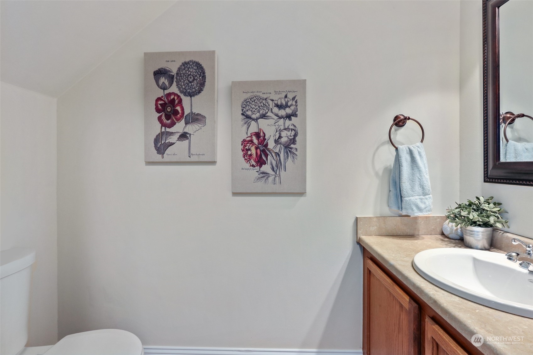 3004 170th Place Southeast Bothell, WA 98012 - Photo 20 of 25 a bathroom with a sink mirror and toilet