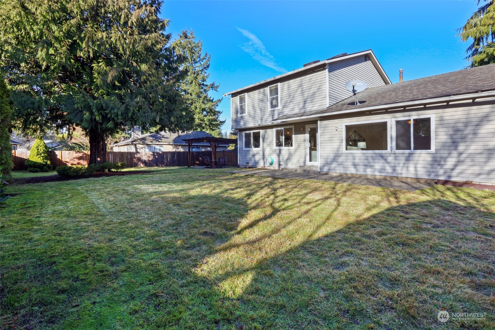 3004 170th Place Southeast Bothell, WA 98012 - Photo 21 of 25 a view of a house with a swimming pool