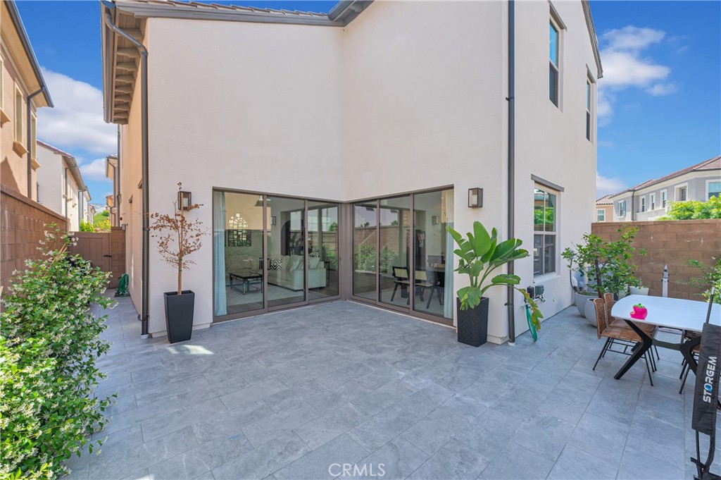 115 Halworth Irvine, CA 92618 - Photo 33 of 33 a view of an chairs and tables in the patio