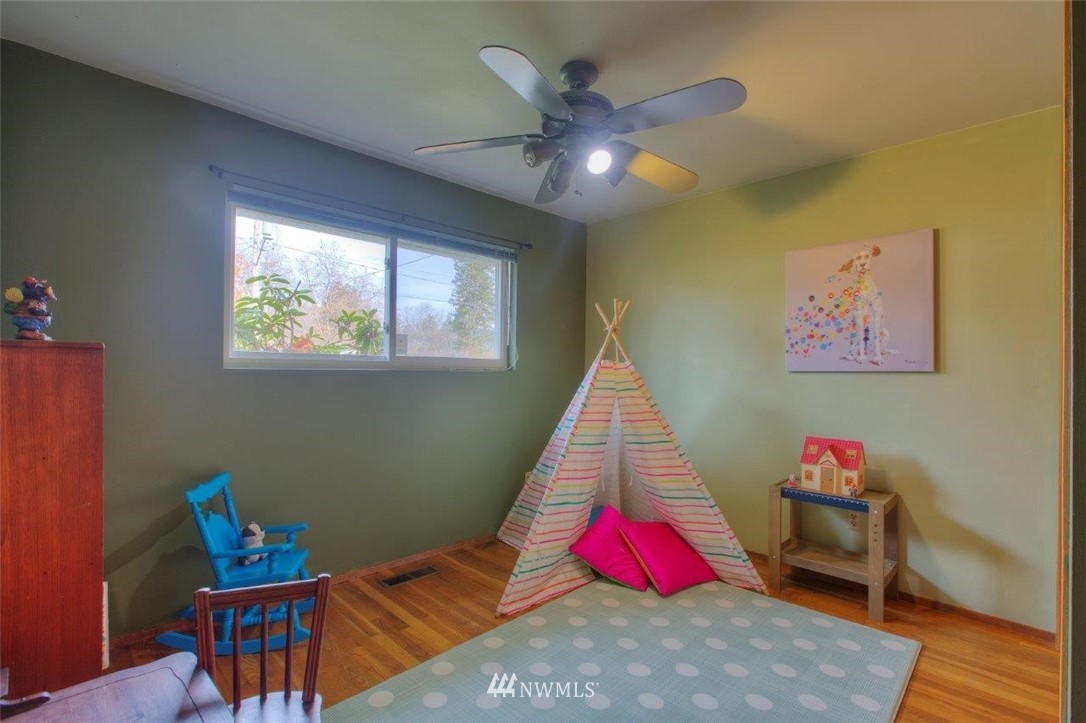 4209 Northeast 11th Street Renton, WA 98059 - Photo 11 of 17 a view of room with furniture and air hockey table
