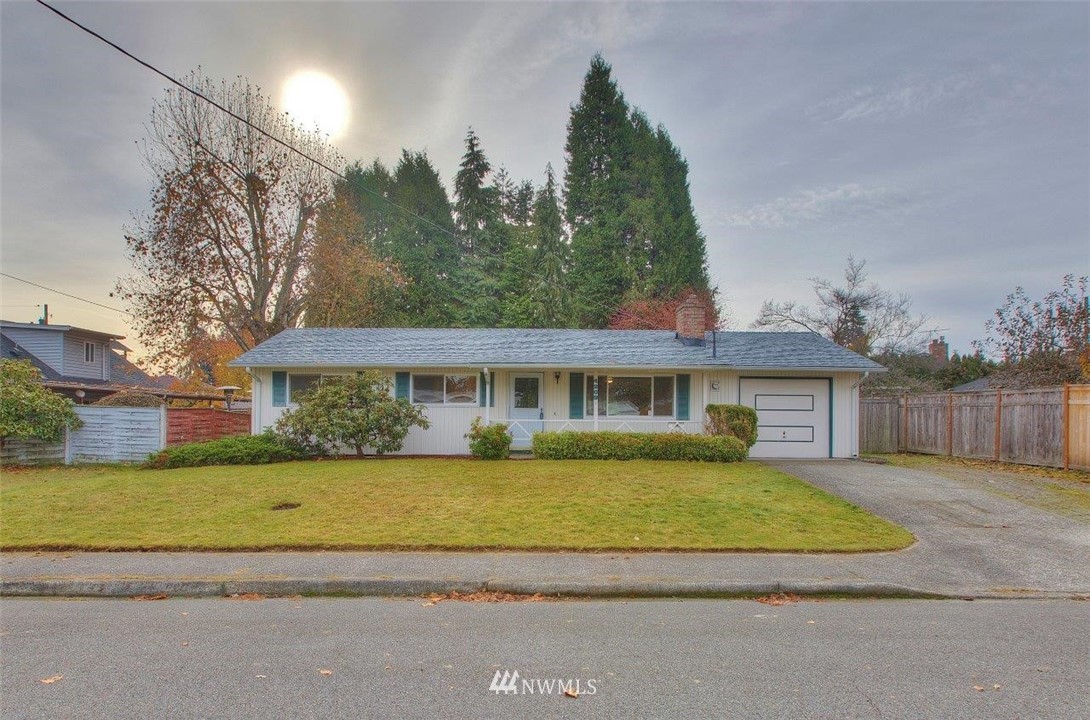 4209 Northeast 11th Street Renton, WA 98059 - Photo 17 of 17 front view of a house with a yard