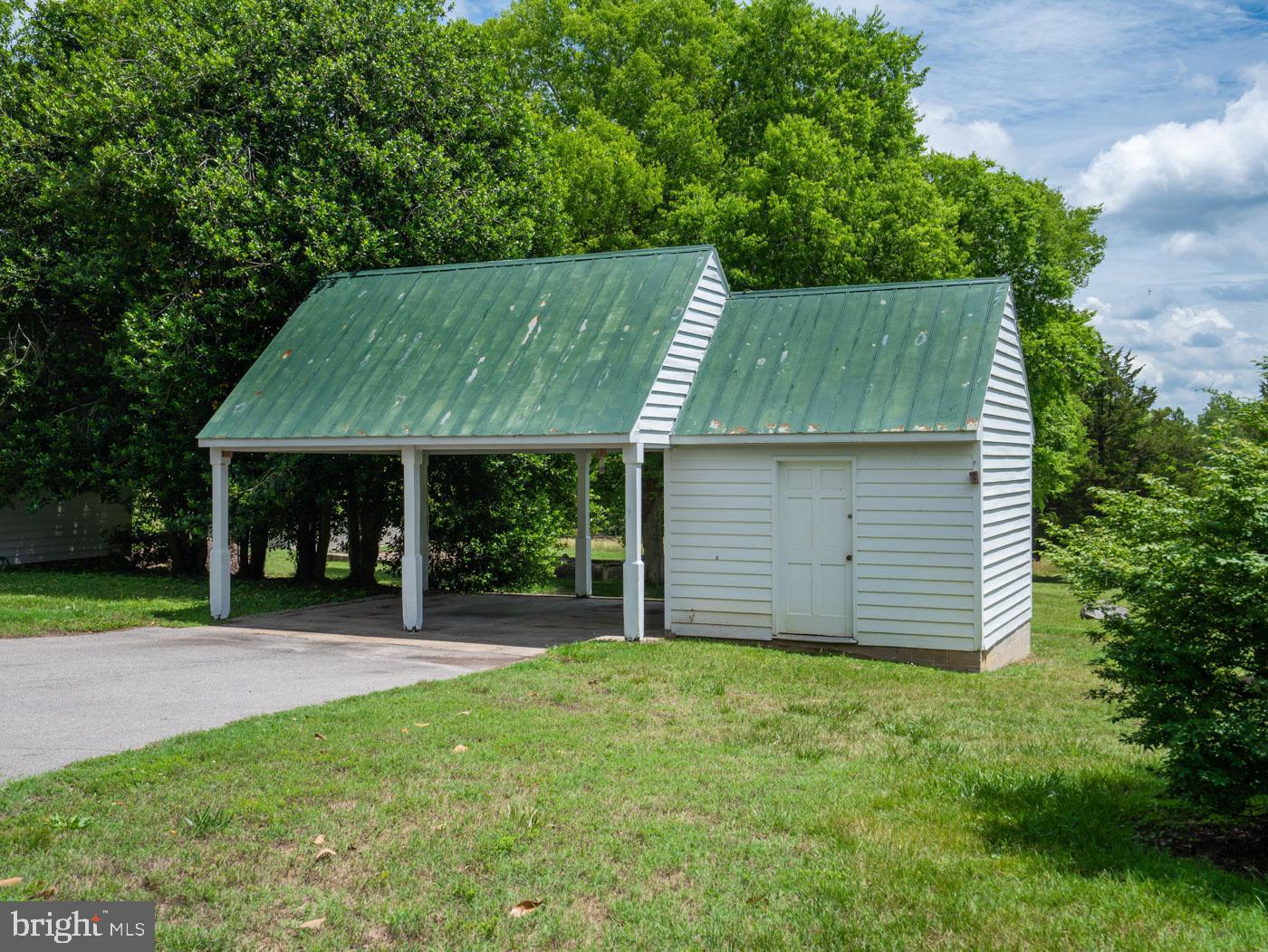 2345 Berry Hill Road Danville, VA 24541 - Photo 111 of 130 Carport with two spaces and storage