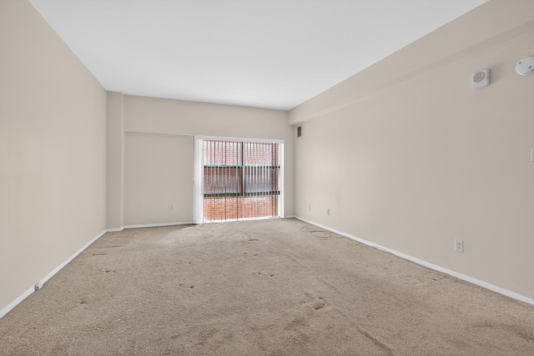 3601 Clarks Lane, Unit 418 Baltimore, MD 21215 - Photo 14 of 28 a view of an empty room with a window