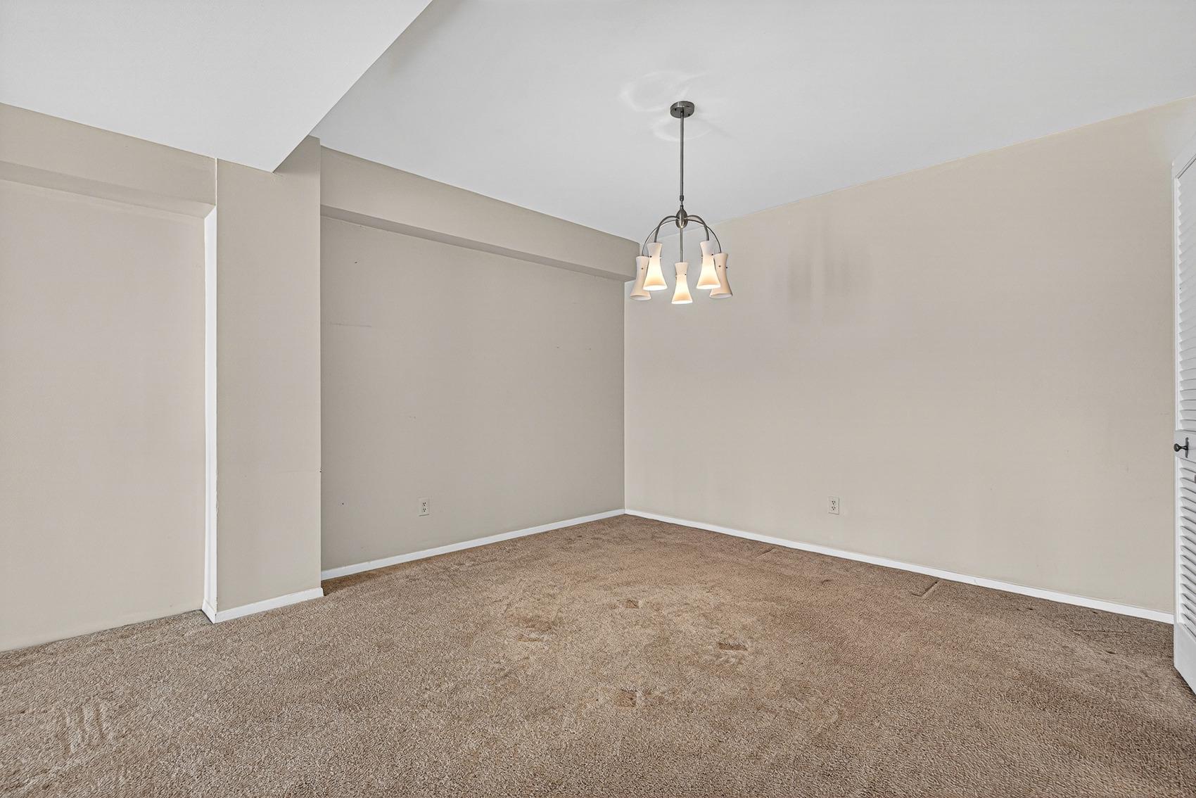 3601 Clarks Lane, Unit 418 Baltimore, MD 21215 - Photo 5 of 28 a view of empty room with windows