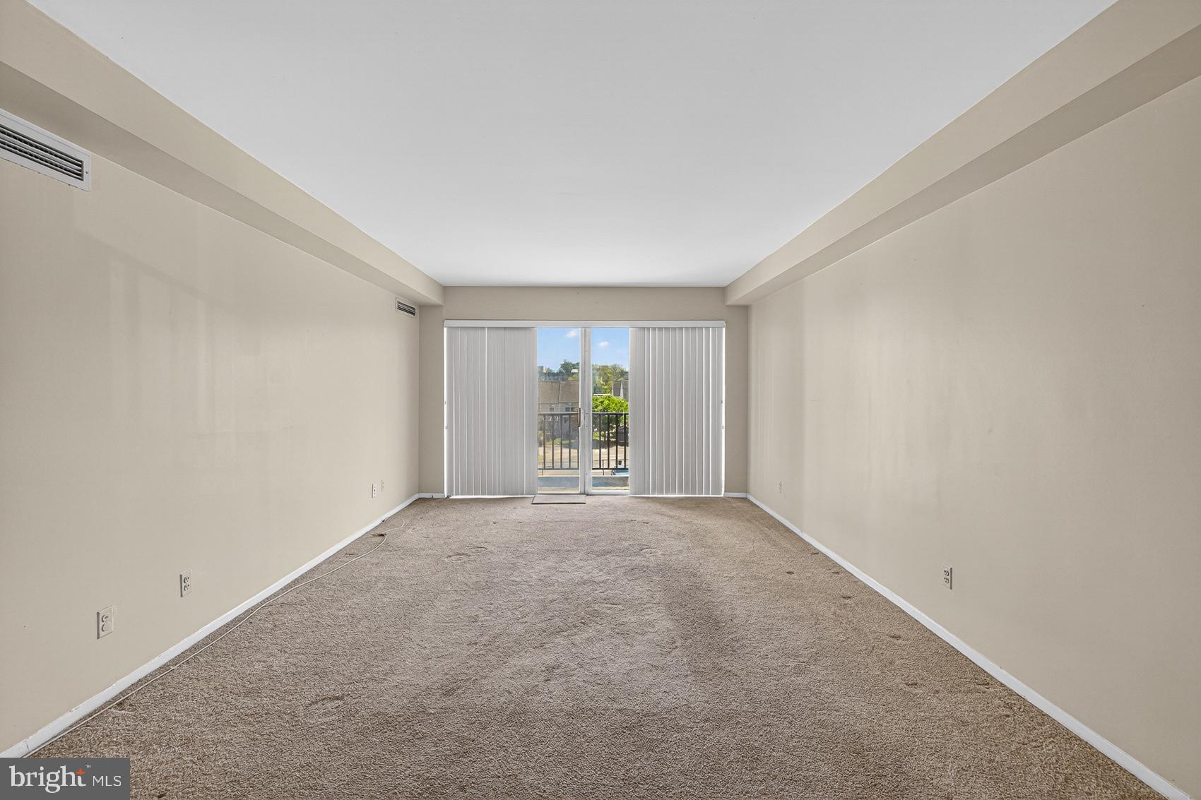 3601 Clarks Lane, Unit 418 Baltimore, MD 21215 - Photo 7 of 28 a view of an empty room with window