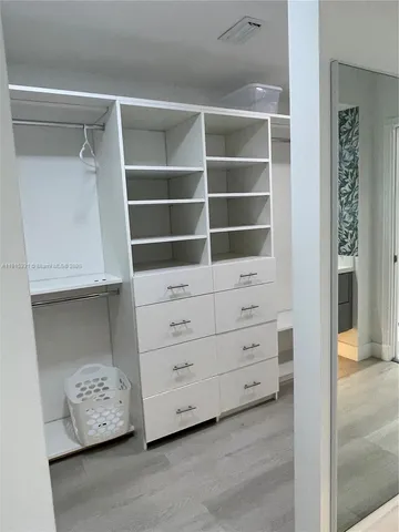 a room with furniture and a window