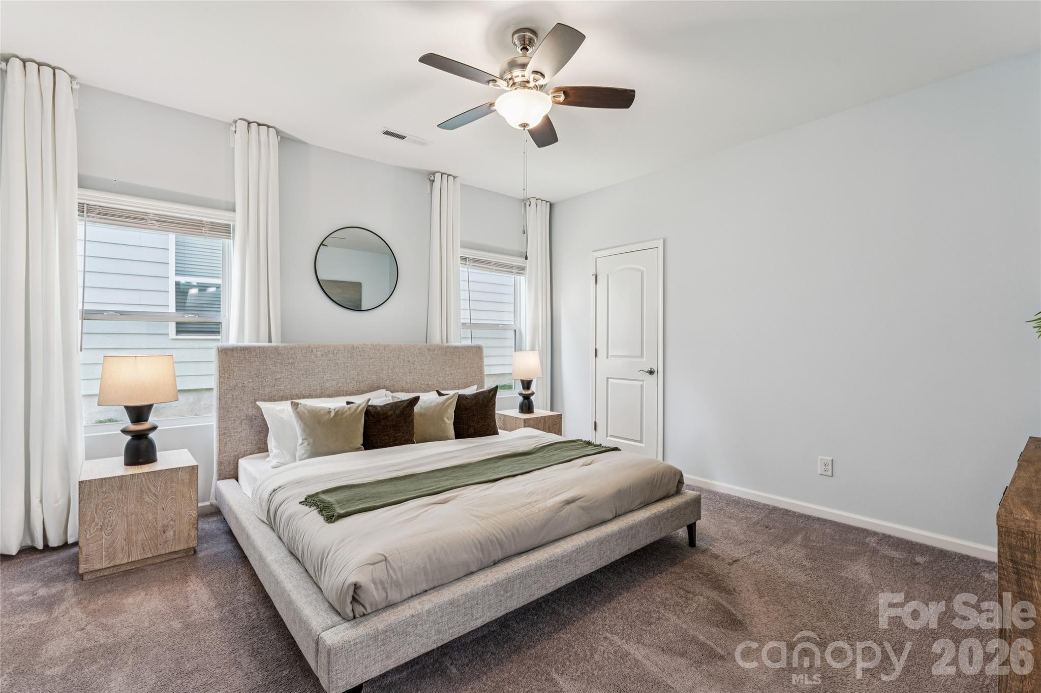50139 Robins Nest Lane Lancaster, SC 29720 - Photo 11 of 30 a bedroom with a bed and a chandelier