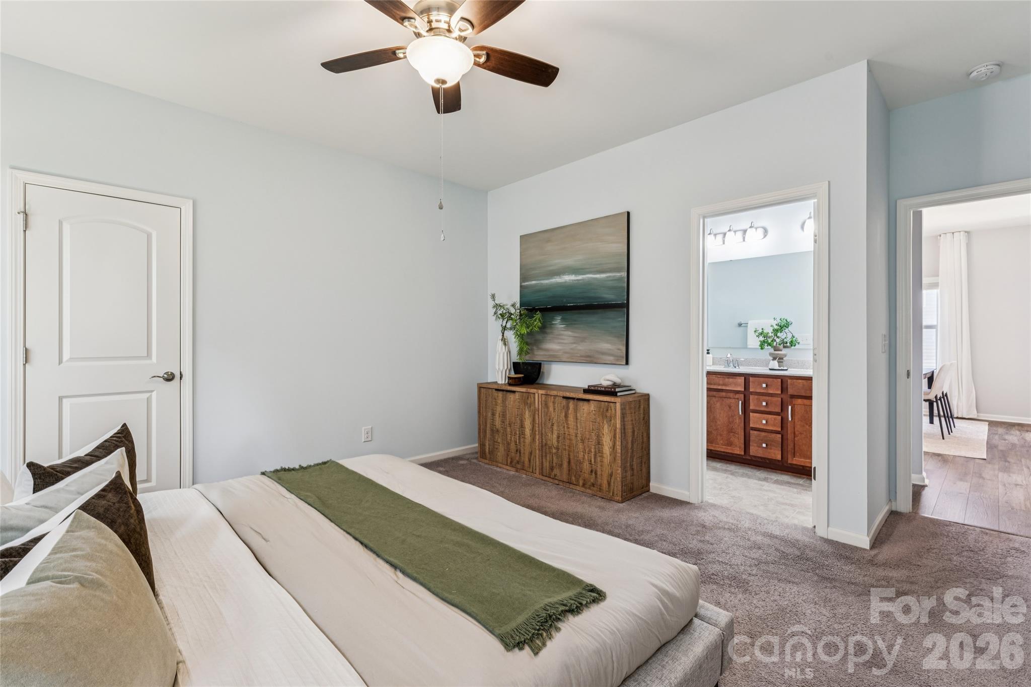 50139 Robins Nest Lane Lancaster, SC 29720 - Photo 13 of 30 a bedroom with a bed and a chandelier