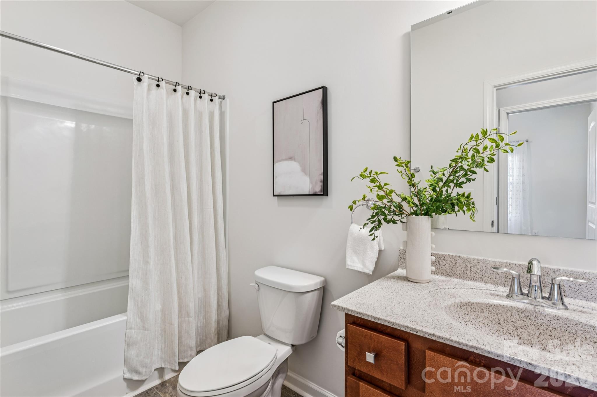 50139 Robins Nest Lane Lancaster, SC 29720 - Photo 18 of 30 a bathroom with a granite countertop sink toilet and shower