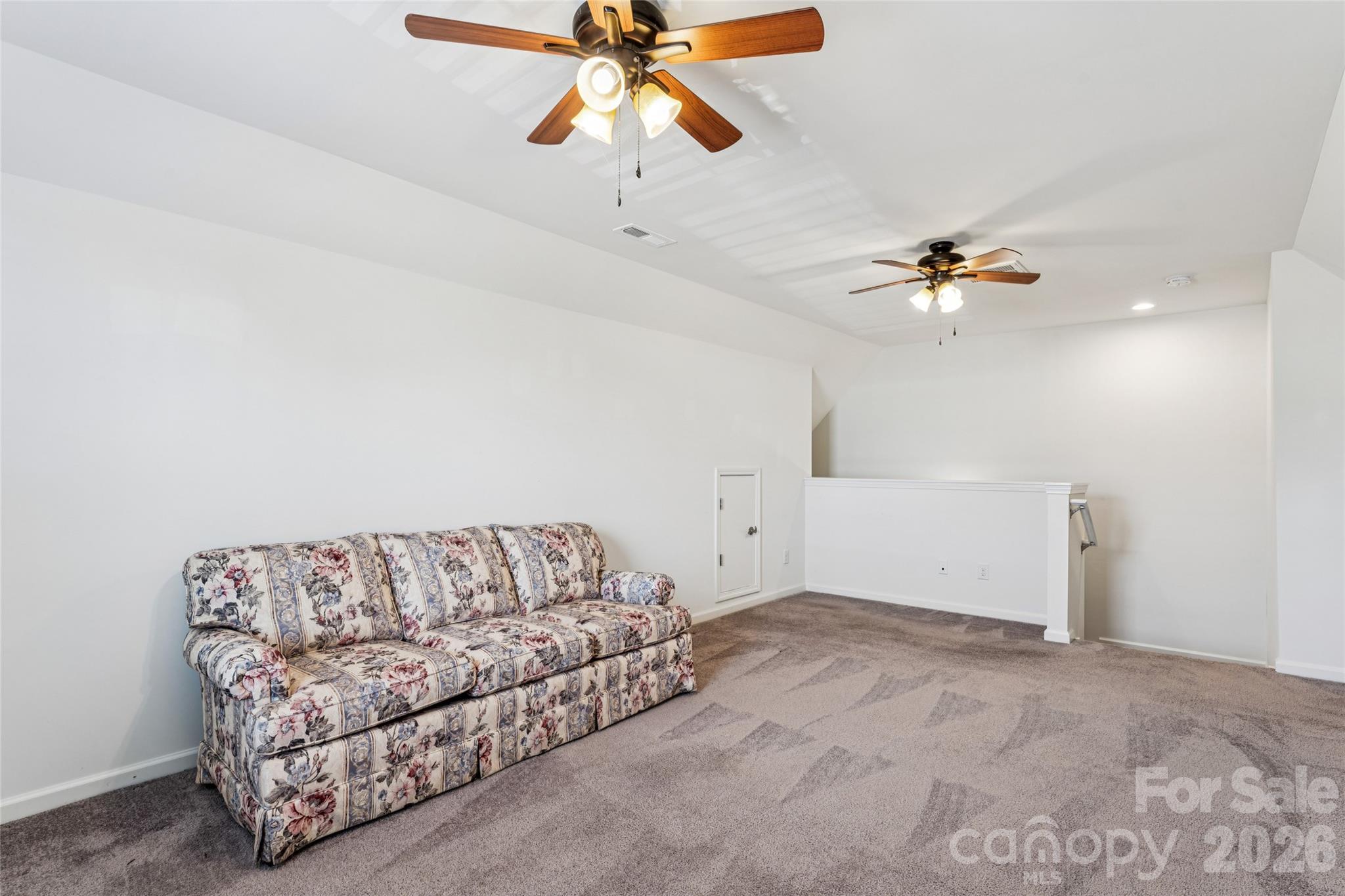 50139 Robins Nest Lane Lancaster, SC 29720 - Photo 20 of 30 a living room with furniture and a ceiling fan