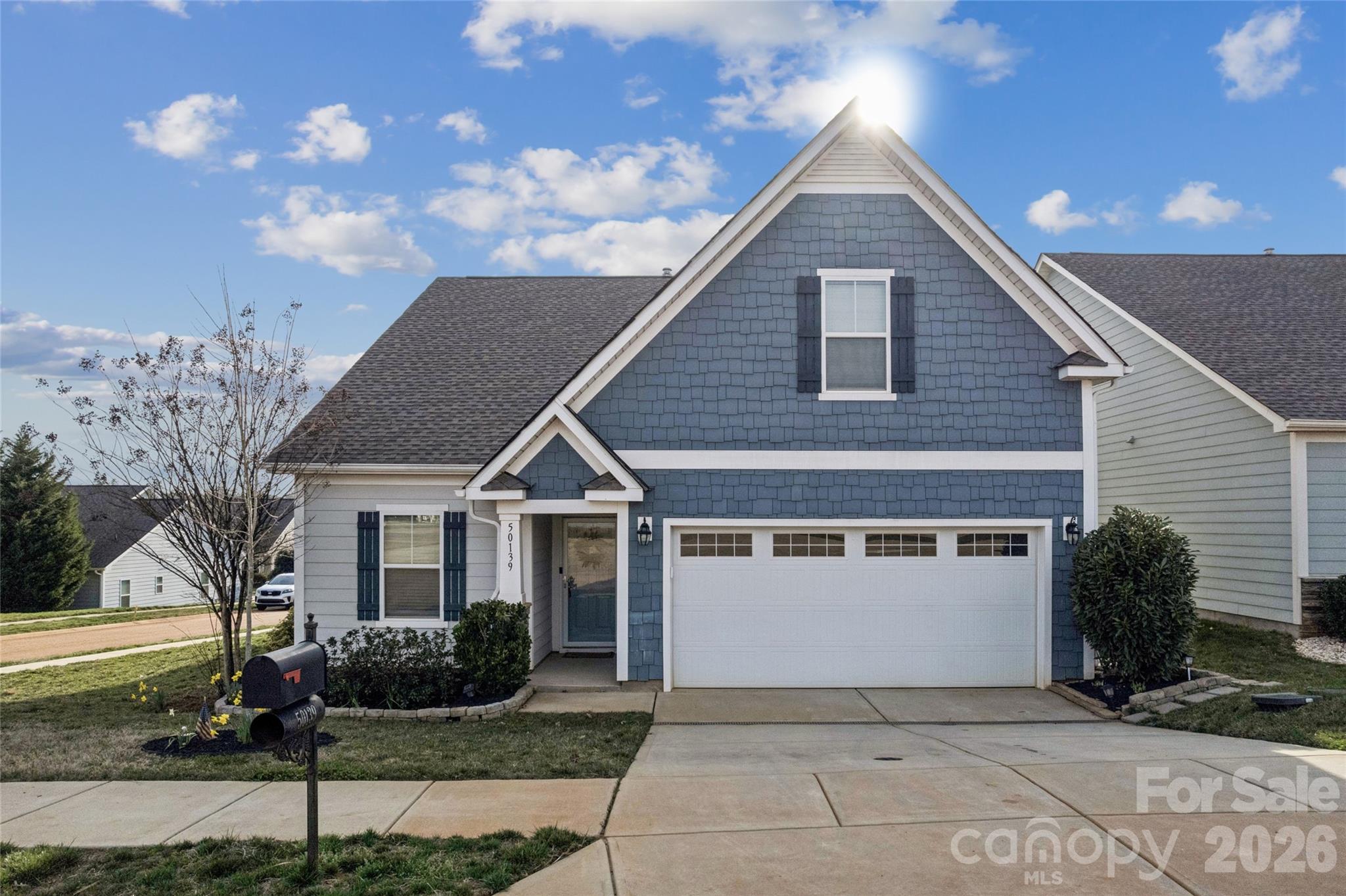 50139 Robins Nest Lane Lancaster, SC 29720 - Photo 22 of 30 a front view of a house with garden