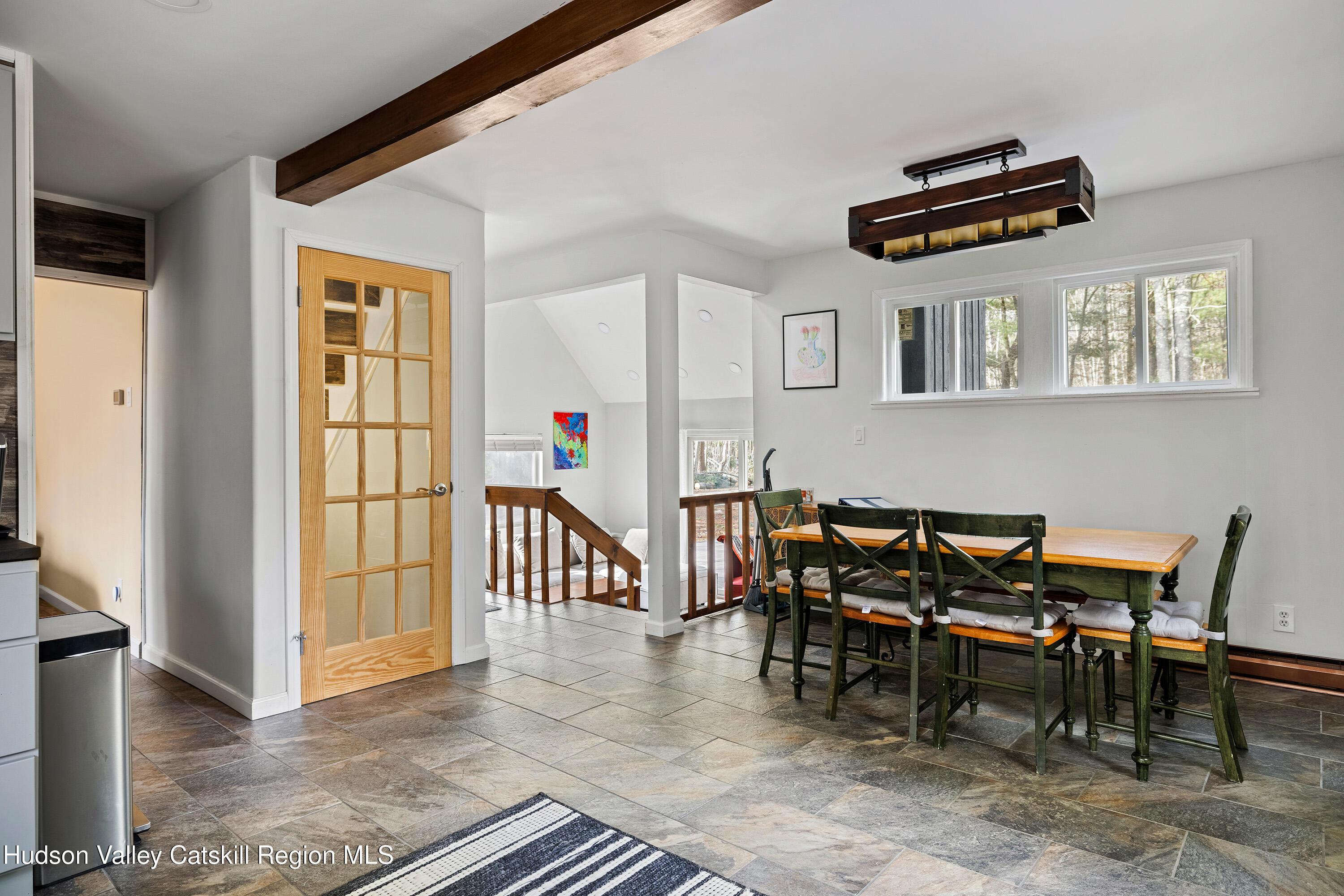 150 Vining Road Windham, NY 12496 - Photo 14 of 49 a dining room with furniture and a floor to ceiling window