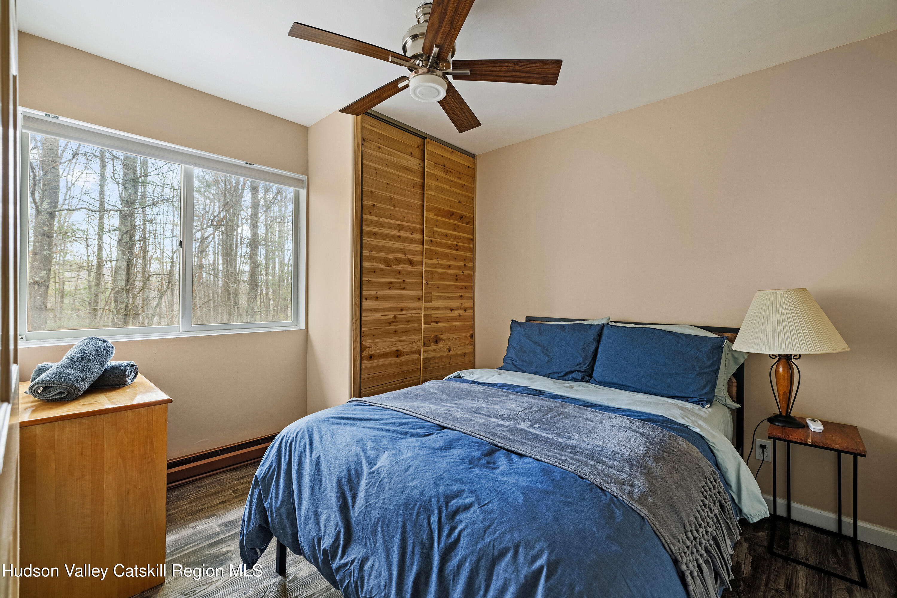 150 Vining Road Windham, NY 12496 - Photo 19 of 49 a bedroom with a bed and a window